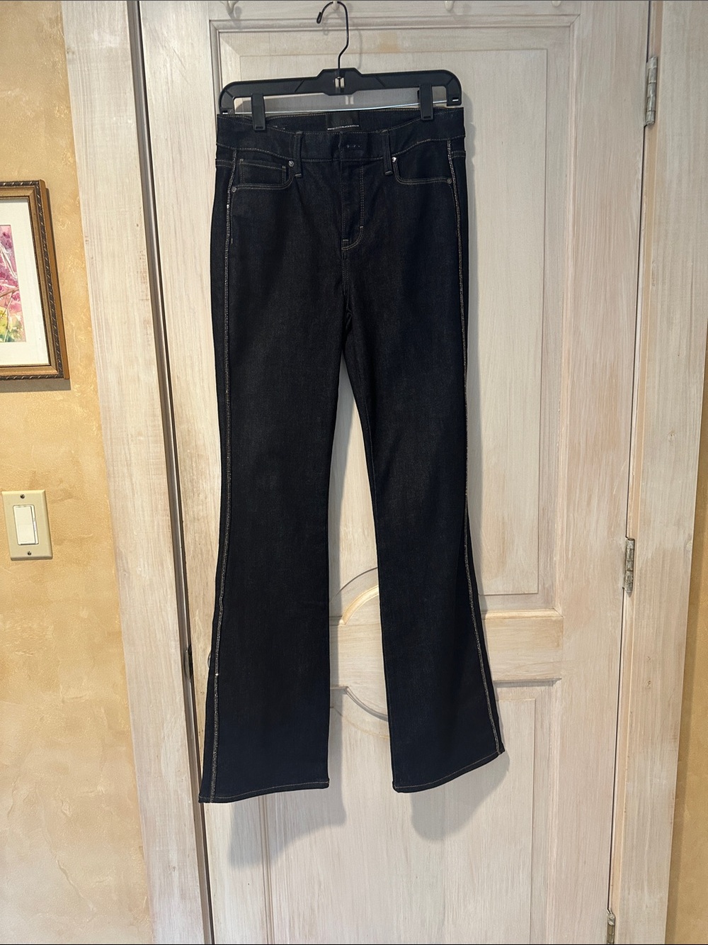 White House Black Market Women's Flared Jeans with side rhinestones size 2.